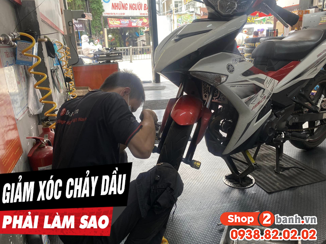 Giảm xóc trước xe máy bị chảy dầu phải làm sao - 1