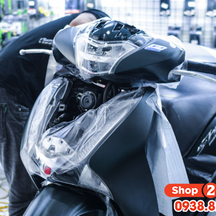 Dán keo trong xe ga lớn, Vespa...